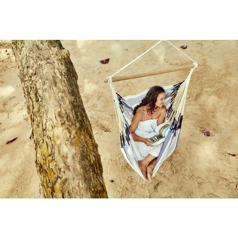 Domingo Sea Salt - Weather-Resistant Comfort Hammock Chair – person reading in a shaded hammock chair