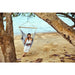 Domingo Sea Salt - Weather-Resistant Comfort Hammock Chair – person seated beneath a tree