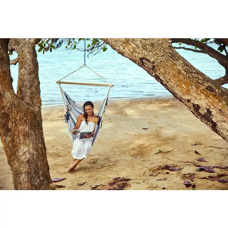 Domingo Sea Salt - Weather-Resistant Comfort Hammock Chair – person seated beneath a tree