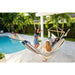 Domingo Sea Salt - Weather-Resistant Comfort Hammock Chair – reclining user beside a pool