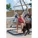 Domingo Sea Salt - Weather-Resistant Comfort Hammock Chair – seated user with a dog nearby