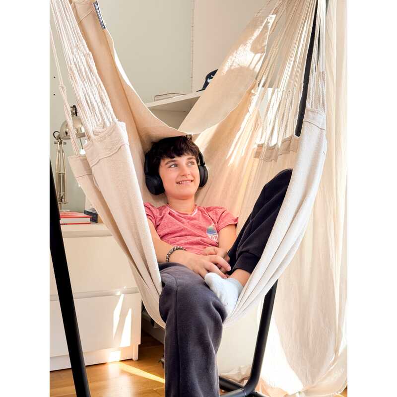 Fiji Organic Latte – Organic Cotton Basic Size Hammock Chair with Galvanized Steel Stand – close view of a kid resting