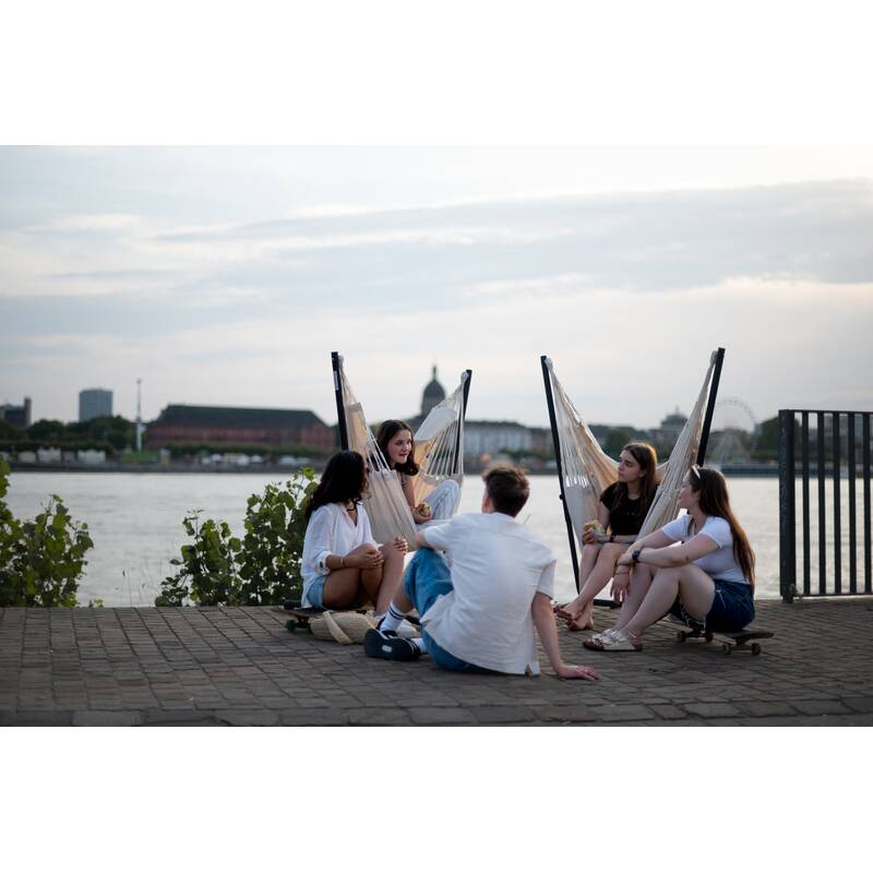 Fiji Organic Latte – Organic Cotton Basic Size Hammock Chair with Galvanized Steel Stand – group beside waterfront chairs