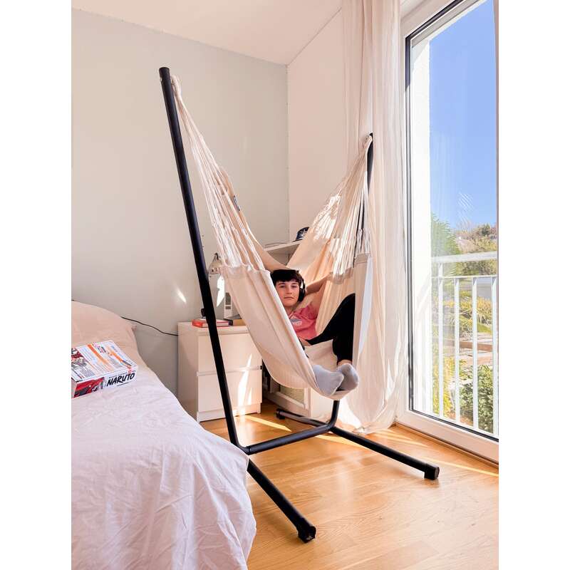 Fiji Organic Latte – Organic Cotton Basic Size Hammock Chair with Galvanized Steel Stand – seated kid beside a window