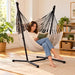 Fiji Organic Zebra – Organic Cotton Comfort Size Hammock Chair with Galvanized Steel Stand – lifestyle illustration of adult reading in the hammock chair in a family reading room