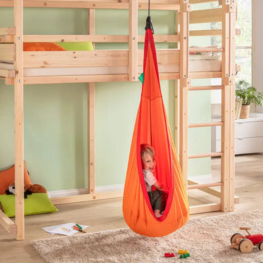 LA SIESTA Joki Foxy Kids Hanging Nest – kid seated under a loft bed