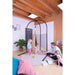 LA SIESTA Joki Teddy Kids Hanging Nest – adult helping a kid beside the stand