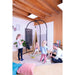 LA SIESTA Joki Teddy Kids Hanging Nest – hanging nest on an Arcada stand in a shared activity room