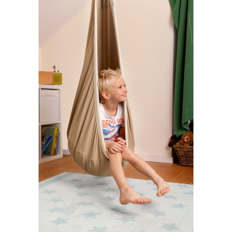 LA SIESTA Joki Teddy Kids Hanging Nest – kid resting in a playroom corner