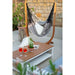 Udine Organic Zebra - Organic Cotton Hammock Chair with FSC® certified Eucalyptus Stand – chair on a stone patio