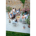 Udine Organic Zebra - Organic Cotton Hammock Chair with FSC® certified Eucalyptus Stand – group relaxing on a patio