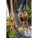 Udine Organic Zebra - Organic Cotton Hammock Chair with FSC® certified Eucalyptus Stand – person seated with a dog