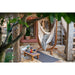 Udine Organic Latte - Organic Cotton Hammock Chair with FSC® certified Eucalyptus Stand – courtyard chair beside a low table