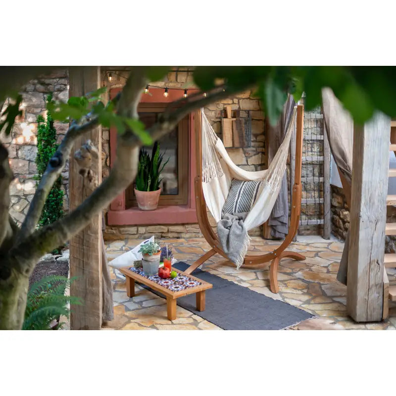 Udine Organic Latte - Organic Cotton Hammock Chair with FSC® certified Eucalyptus Stand – courtyard chair beside a low table