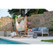 Udine Organic Latte - Organic Cotton Hammock Chair with FSC® certified Eucalyptus Stand – empty chair on a stone patio