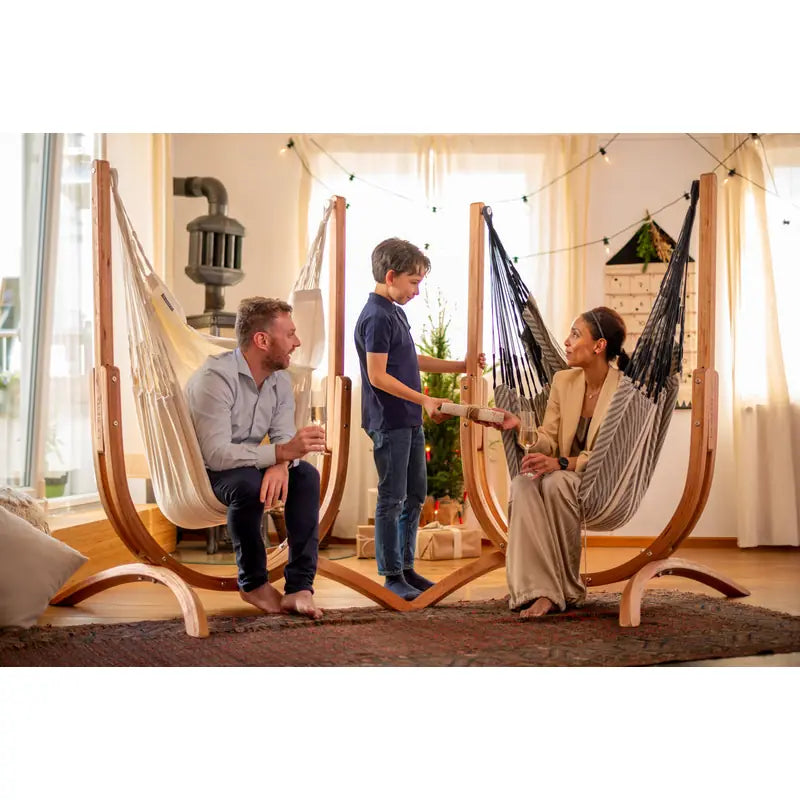 Udine Organic Latte - Organic Cotton Hammock Chair with FSC® certified Eucalyptus Stand – family gathered in a sunny room