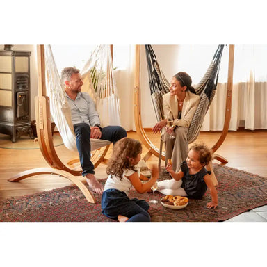 Udine Organic Latte - Organic Cotton Hammock Chair with FSC® certified Eucalyptus Stand – family reading and playing in a living room