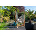 Udine Outdoor Almond - Weather-Resistant Hammock Chair with FSC® certified Eucalyptus Stand – chair on a garden patio