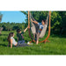 Udine Outdoor Almond - Weather-Resistant Hammock Chair with FSC® certified Eucalyptus Stand – friends relaxing beside the chair