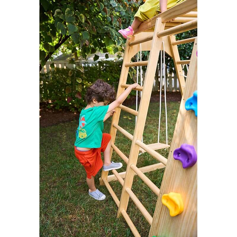 magnolia_outdoor_and_indoor_real_wood_7_in_1_playset_boy_climbing