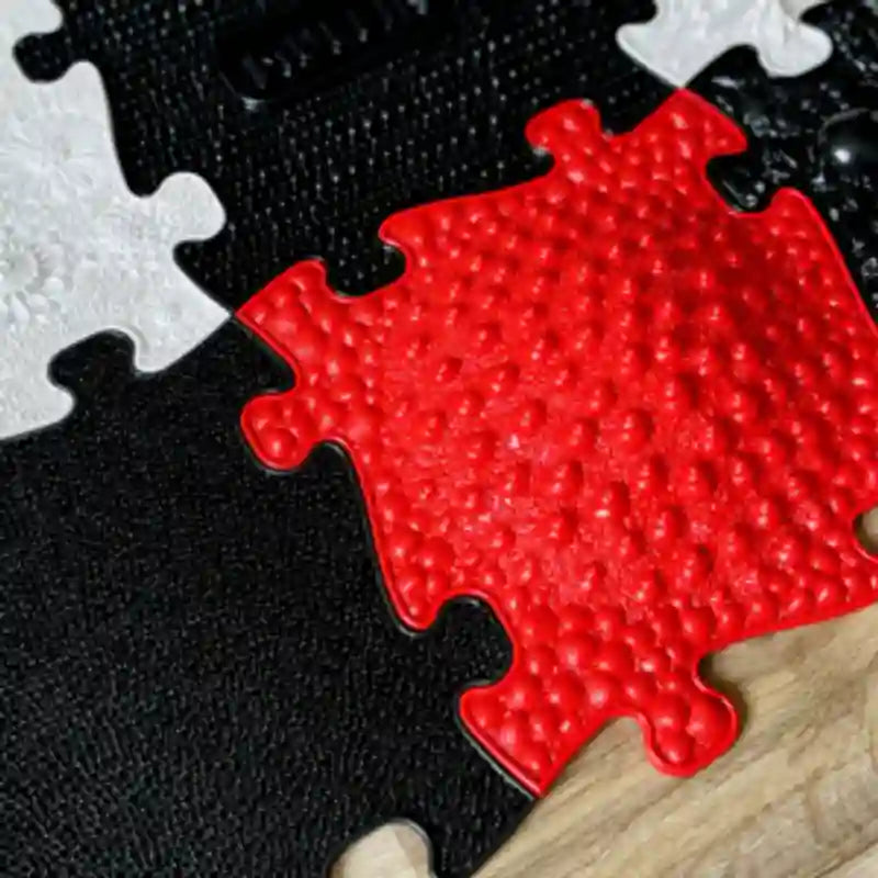 Close view of a textured mat from the Muffik Tots Vision Puzzle Set