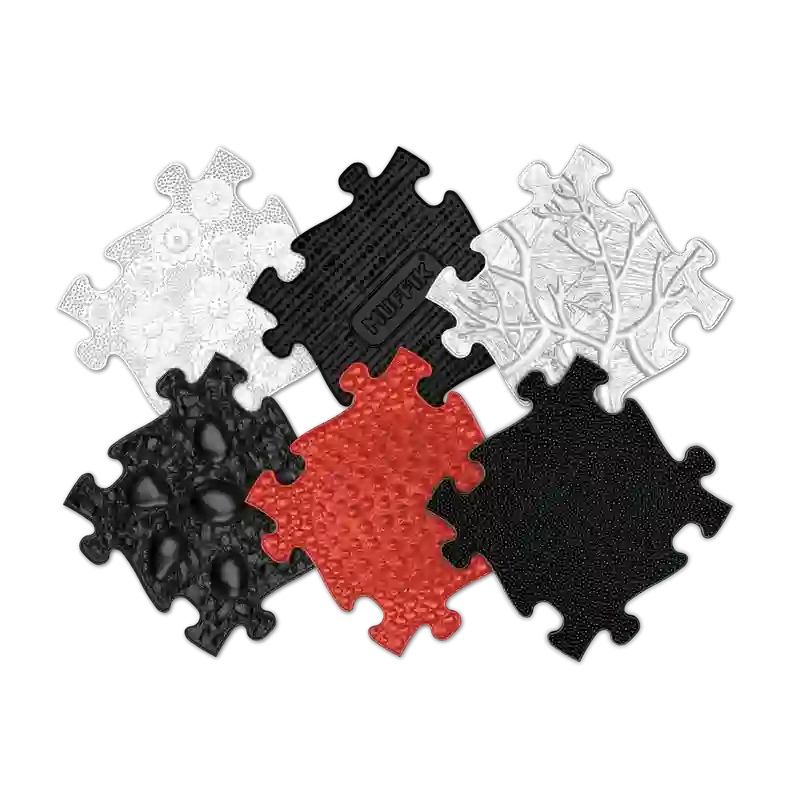 Muffik Tots Vision sensory playmat arranged in a high contrast black white and red layout
