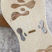 Close view of the Orrin Balance Board curved wooden surface