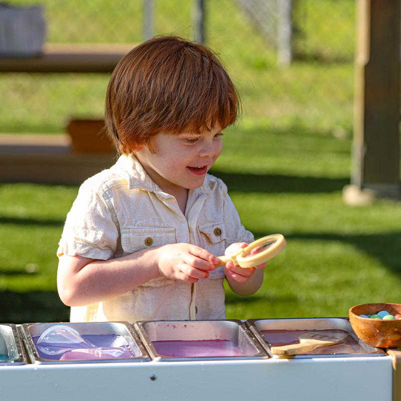 outdoor potion station with boy playing 