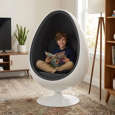 Oval Serenity Pod - Gray - child reading in the cushioned gray pod