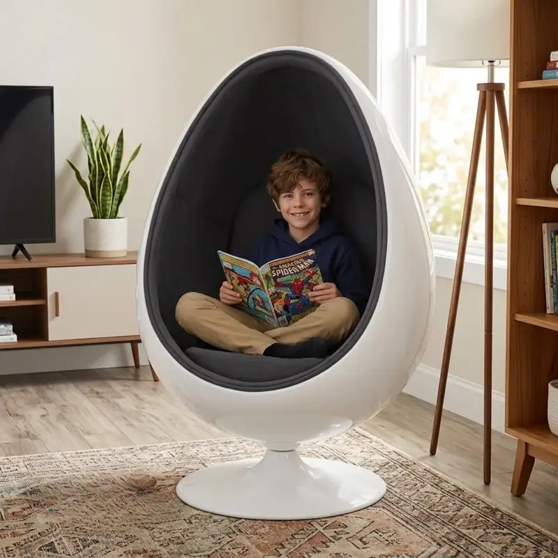 Oval Serenity Pod - Gray - child reading in the cushioned gray pod