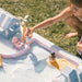 Smol Pool Day Water Table poolside shack with chairs, loungers, and play accessories