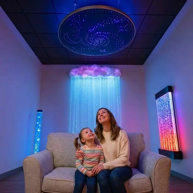 Round Fiber Optic Ceiling Panel with Shooting Stars - adult and child seated below the star ceiling panel