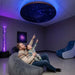 Round Fiber Optic Ceiling Panel with Shooting Stars - family looking toward the illuminated ceiling panel