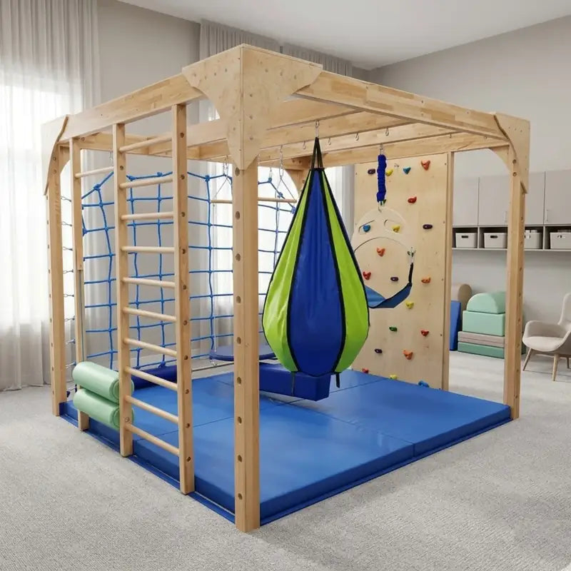 Sensis™ Active Sensory Integration System - movement frame in a room with blue mats and additional swings shown