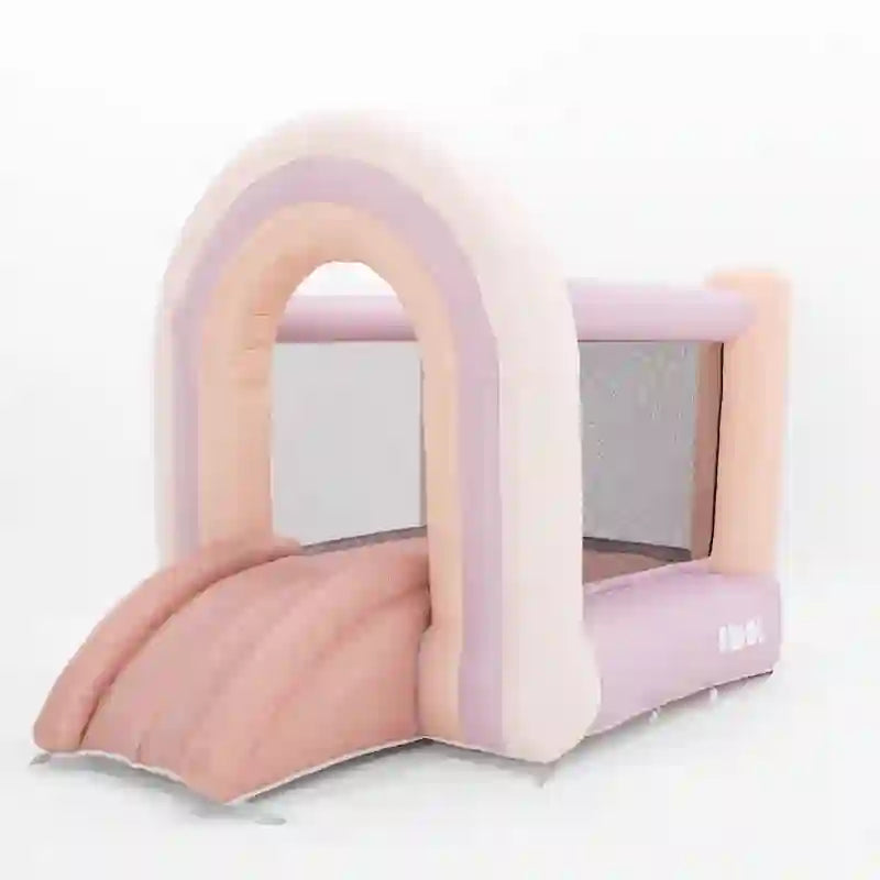 Side view of the Smol Rainbow Pink Bounce House 6 x 6 with slide