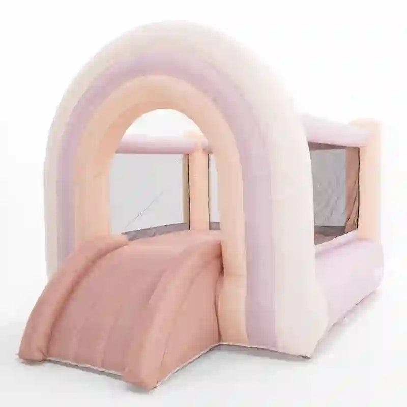 Side view of the Smol Rainbow Pink Bounce House 8 x 8 with slide