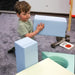soft_play_foam_block_set_challenger_for_sale_light_pastel_boy_playing_blocks