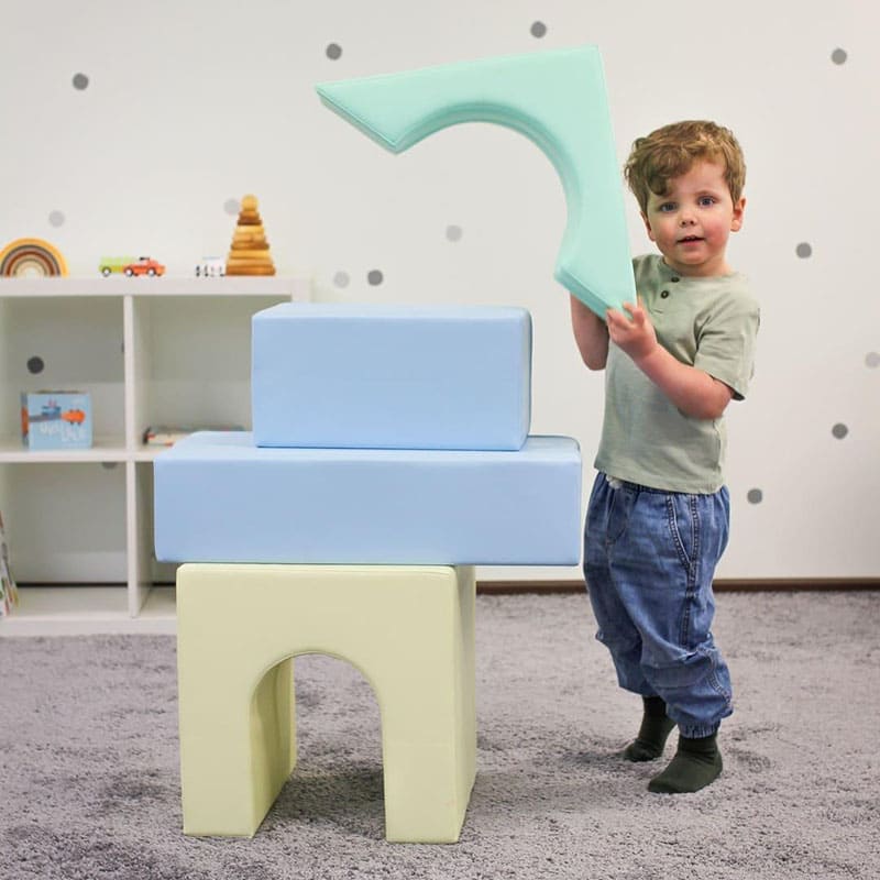 soft_play_foam_block_set_challenger_light_pastel_little_boy_building_tower