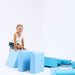 soft_play_set_castle_blue_girl_kneeling_on_blocks