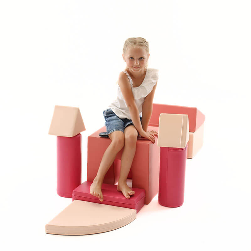 soft_play_set_castle_pink_girl_sitting_smiling