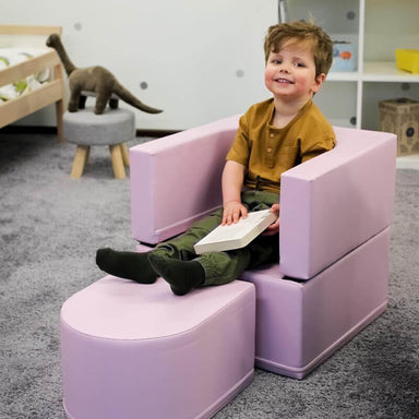 soft_play_chair_snoozy_kid_sitting