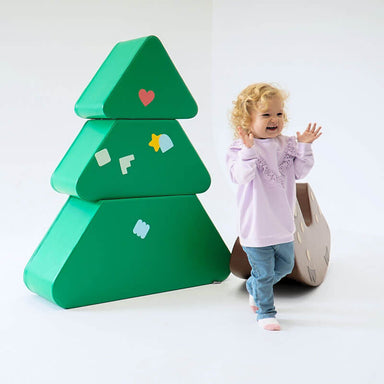 soft play tree with a happy kid