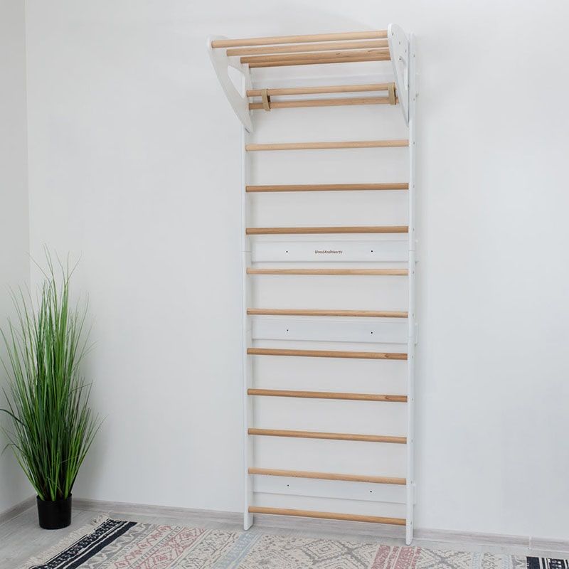 Swedish Wall Ladder – White and natural wood wall bars viewed from the front