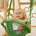 sweetgum sensory gym green swing with kid playing
