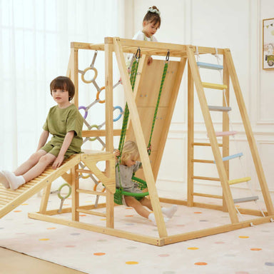 Sweetgum Indoor Sensory Playset (Large) with child climbing the wooden sensory gym for indoor play
