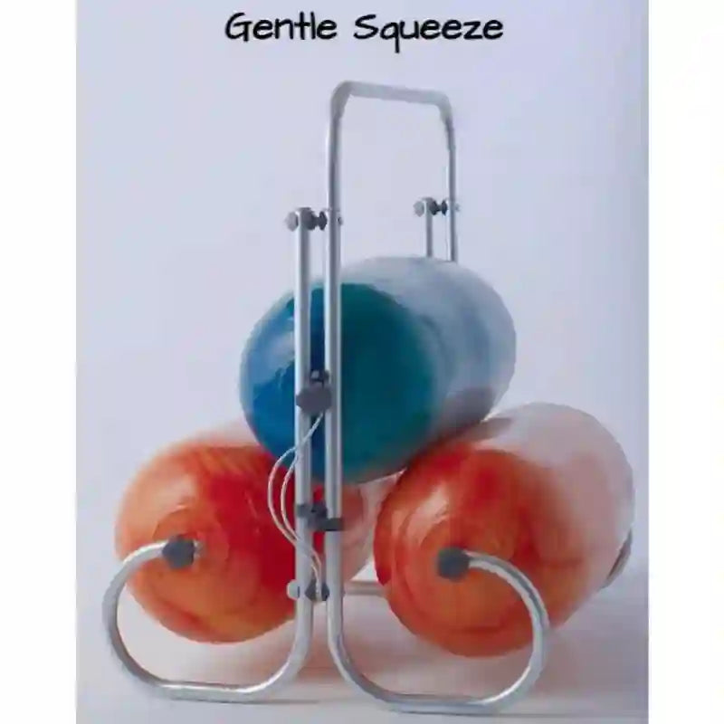 Kid receiving gentle pressure between the TFH Squeeze Machine rollers