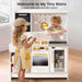 Tiny Land® BistroSwitch Play Kitchen – Two children taking an order at the Cream kitchen