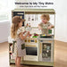 Tiny Land® BistroSwitch Play Kitchen – Two children taking an order at the Green kitchen
