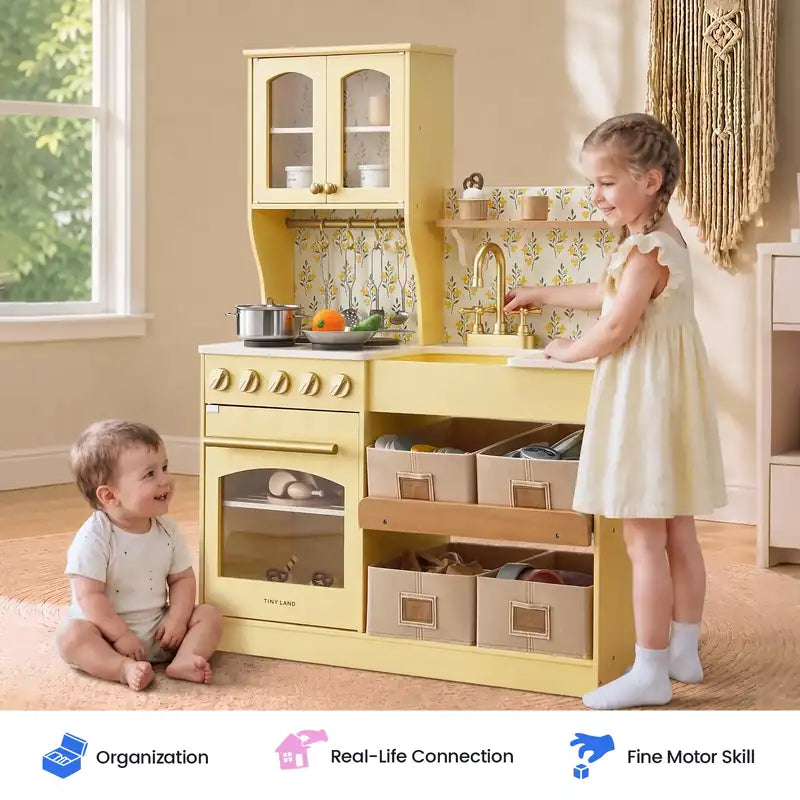Tiny Land® Wooden Play Kitchen with Storage for Creative Toddlers – Two children beside the Pale Yellow kitchen