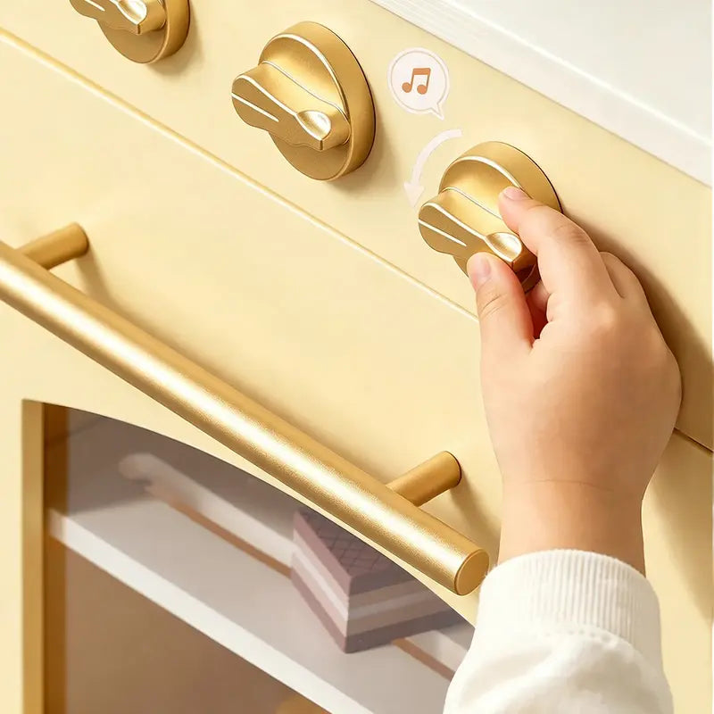 Tiny Land® Wooden Play Kitchen with Storage for Creative Toddlers – Close-up of a hand turning a Pale Yellow kitchen knob
